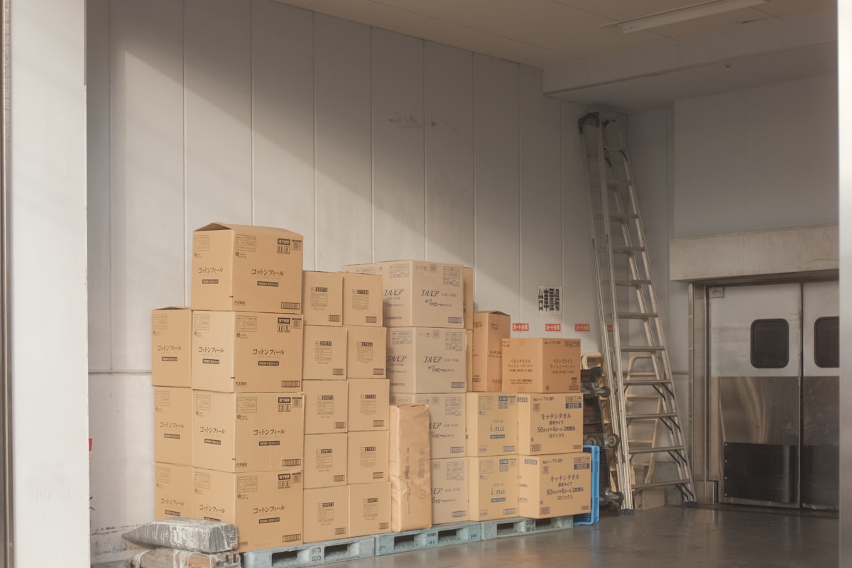 Delivery driver planning routes inside a courier van